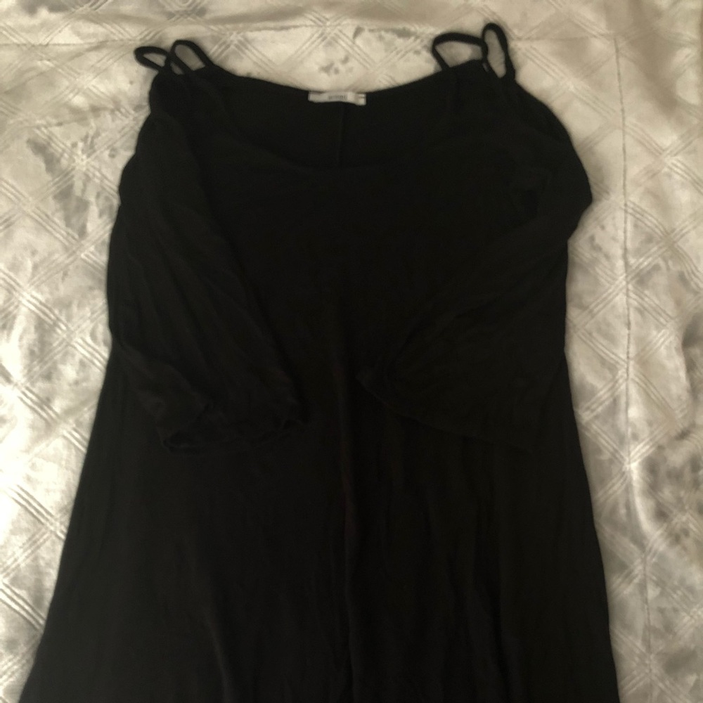 Off the shoulder long black shirt.